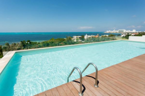 Departamento en Zona Hotelera con acceso a alberca en rooftop